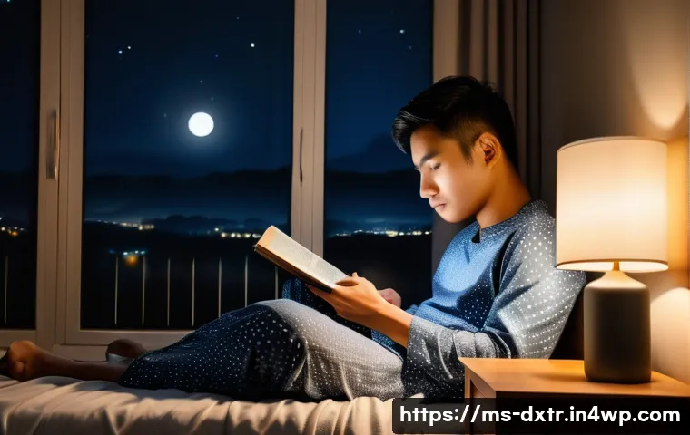 디지털 번아웃과 수면의 관계 - A cozy bedroom scene in a modern Malaysian home during nighttime, showing a young adult man sitting ...